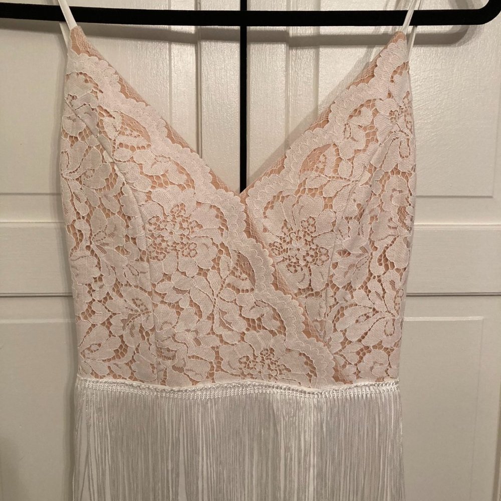 Beautiful white lace and tasseled gown by Giffniseti. Size S.